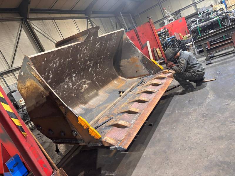 Réparation de l'attaque de mon godet chargeur en région Aquitaine